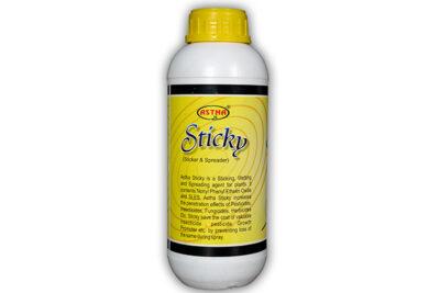 Image of Astha Sticky, a plant adjuvant product for improving crop yield and overall plant health. The product is a clear liquid in a HDP bottle with a yellow label and cap.